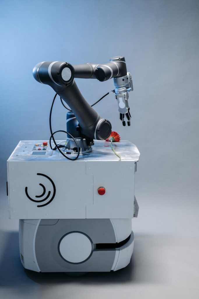 Sleek industrial robot arm in a laboratory setting, showcasing technology and innovation.