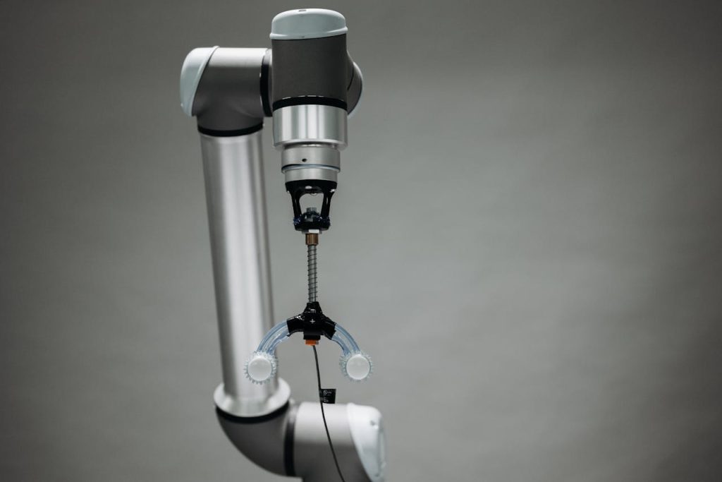 Close-up of an advanced robotic arm equipped with precision tools, showcasing technology and innovation.